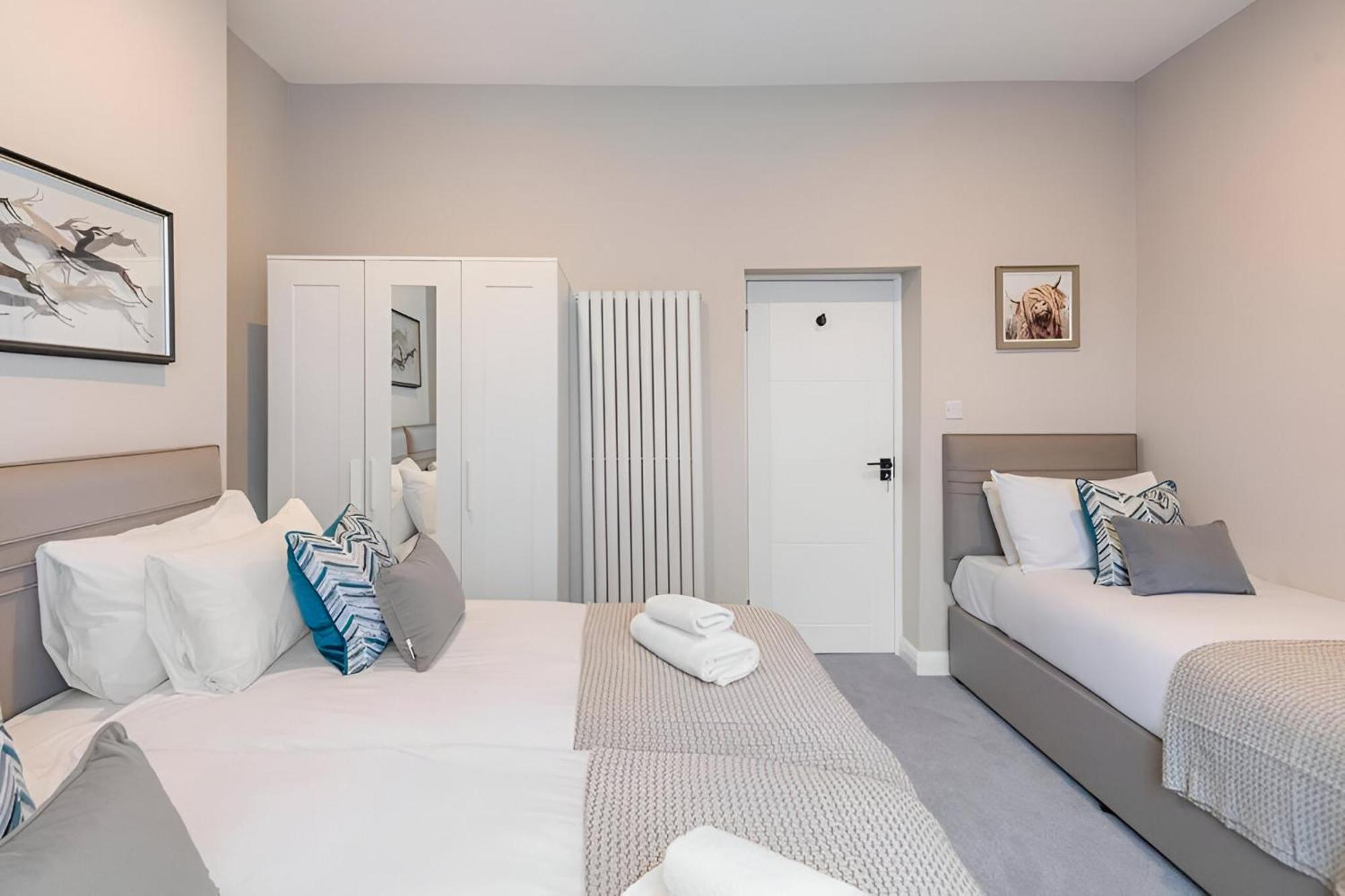 Appartement Earthy Elegance Stylish 4br For Urban Escapes